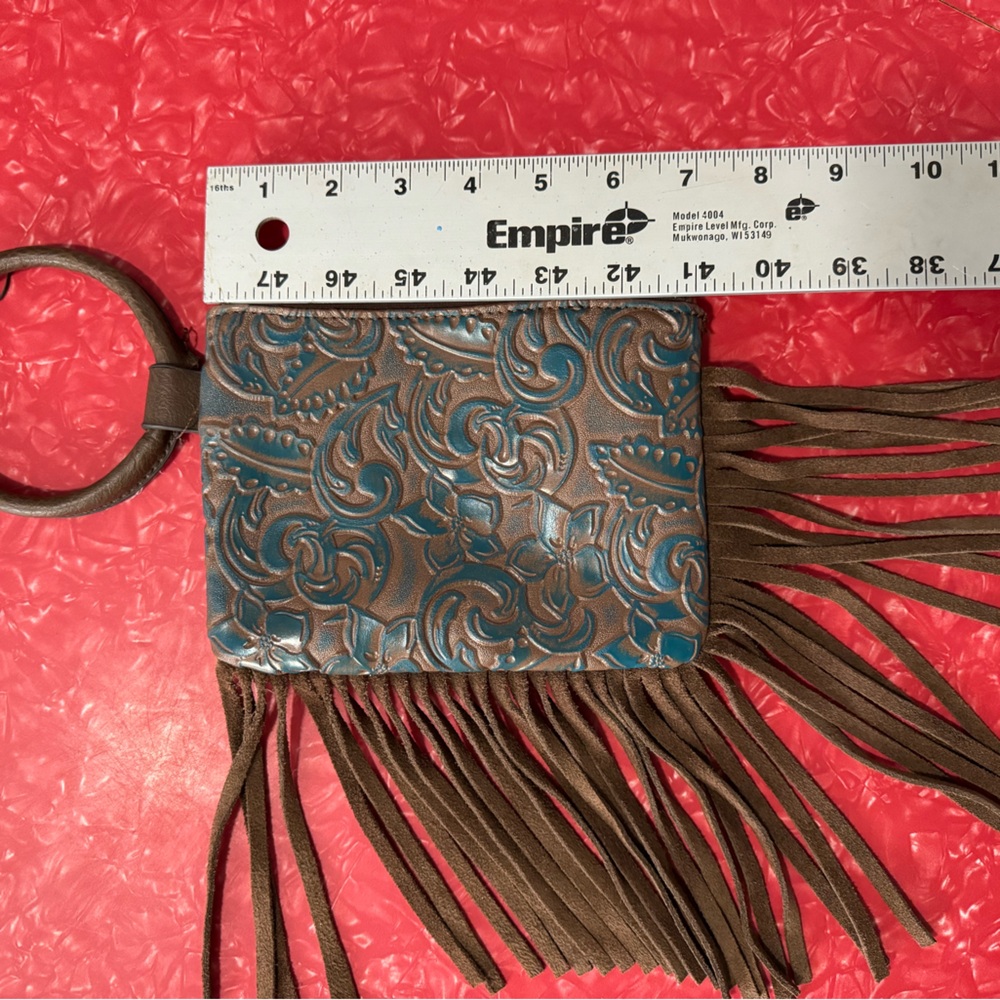 Justin turquoise washed tooled leather purse with fringe